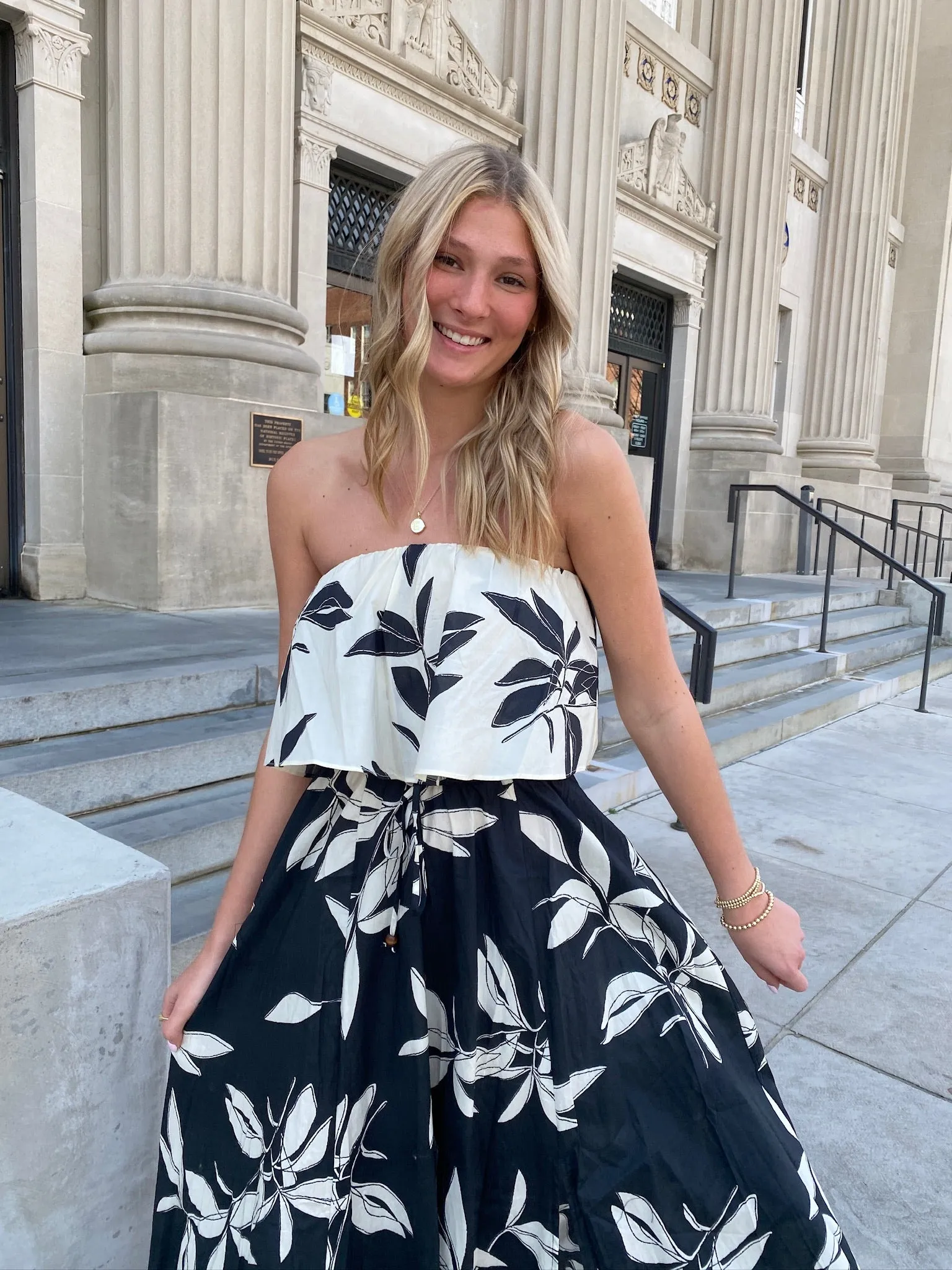 BLACK AND WHITE FLORAL MAXI DRESS WITH COLOR-BLOCK FLOUNCED TOP AND TIE WAIST