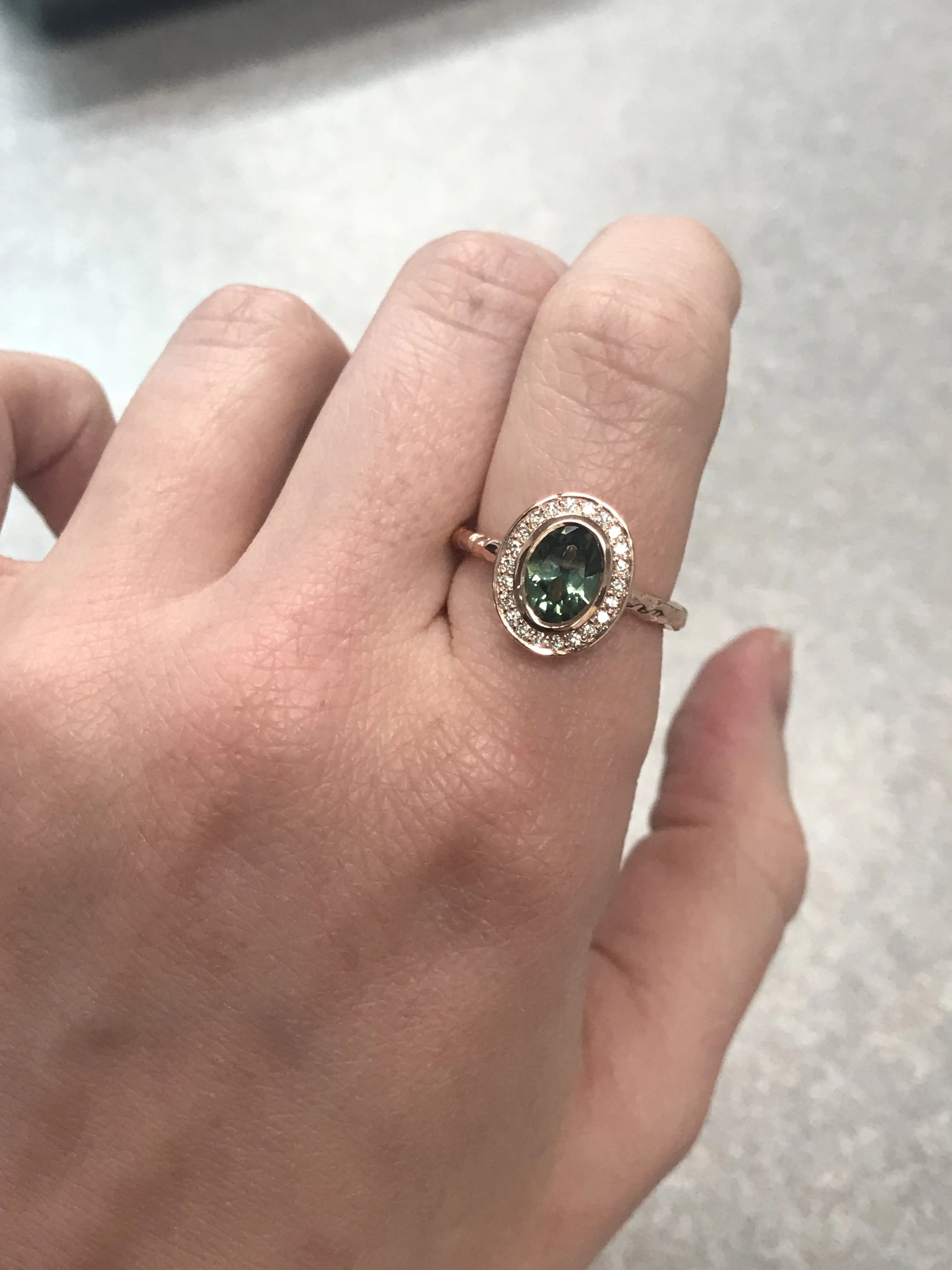 Oval Bezel Set 1.49ct Color Changing Teal Sapphire and Diamond Halo Engagement Ring - 14k Rose Gold Evergreen Band