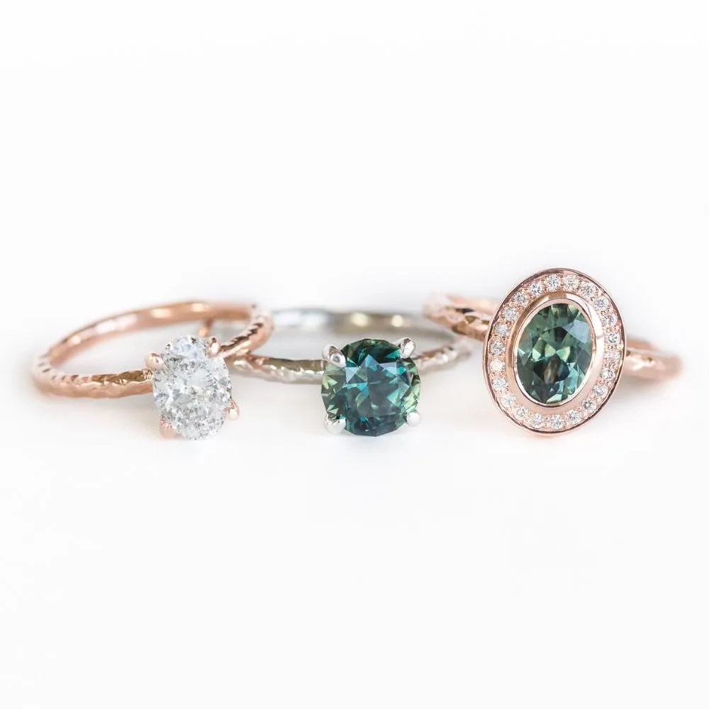 Oval Bezel Set 1.49ct Color Changing Teal Sapphire and Diamond Halo Engagement Ring - 14k Rose Gold Evergreen Band