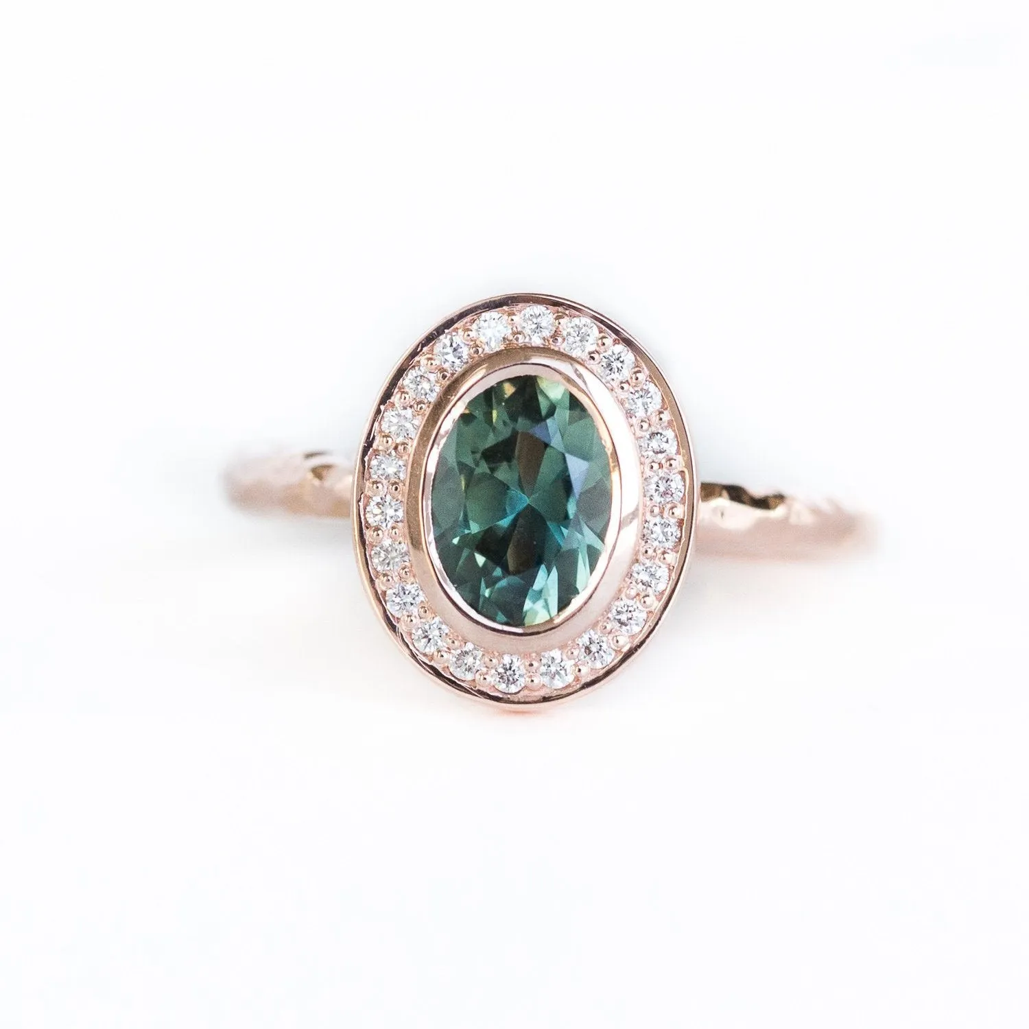 Oval Bezel Set 1.49ct Color Changing Teal Sapphire and Diamond Halo Engagement Ring - 14k Rose Gold Evergreen Band