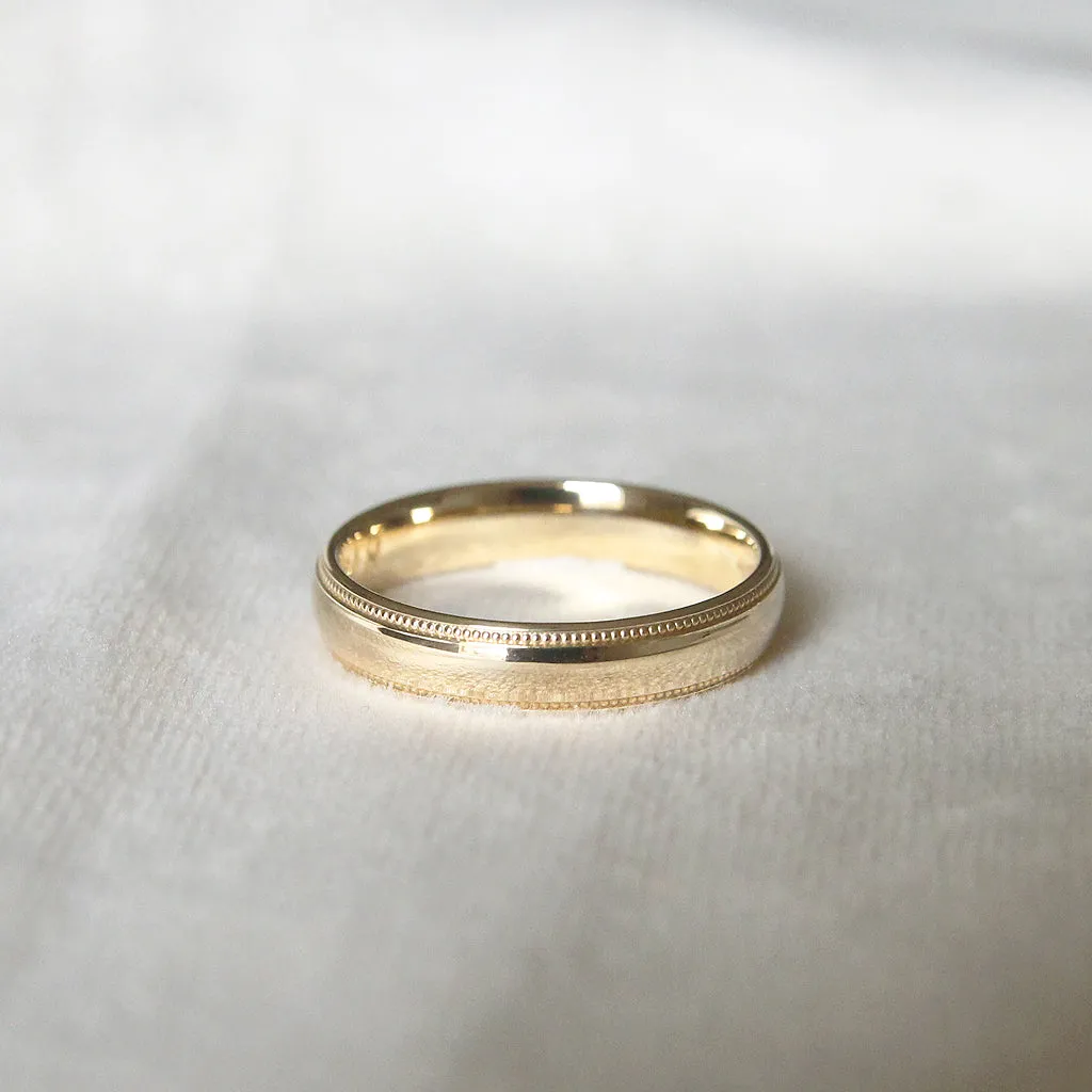 The Court Shape Wedding Band with Mill Grain Edges